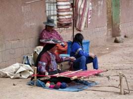 Lady weaving at Wiracocha Market, Peru